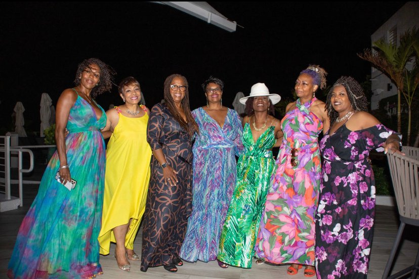 Group of women celebrating together on a luxury trip